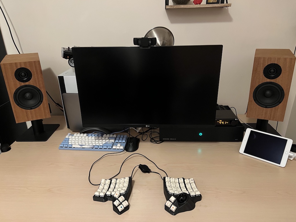 Picture of my desk, monitor, keyboard, and Hi-Fi system